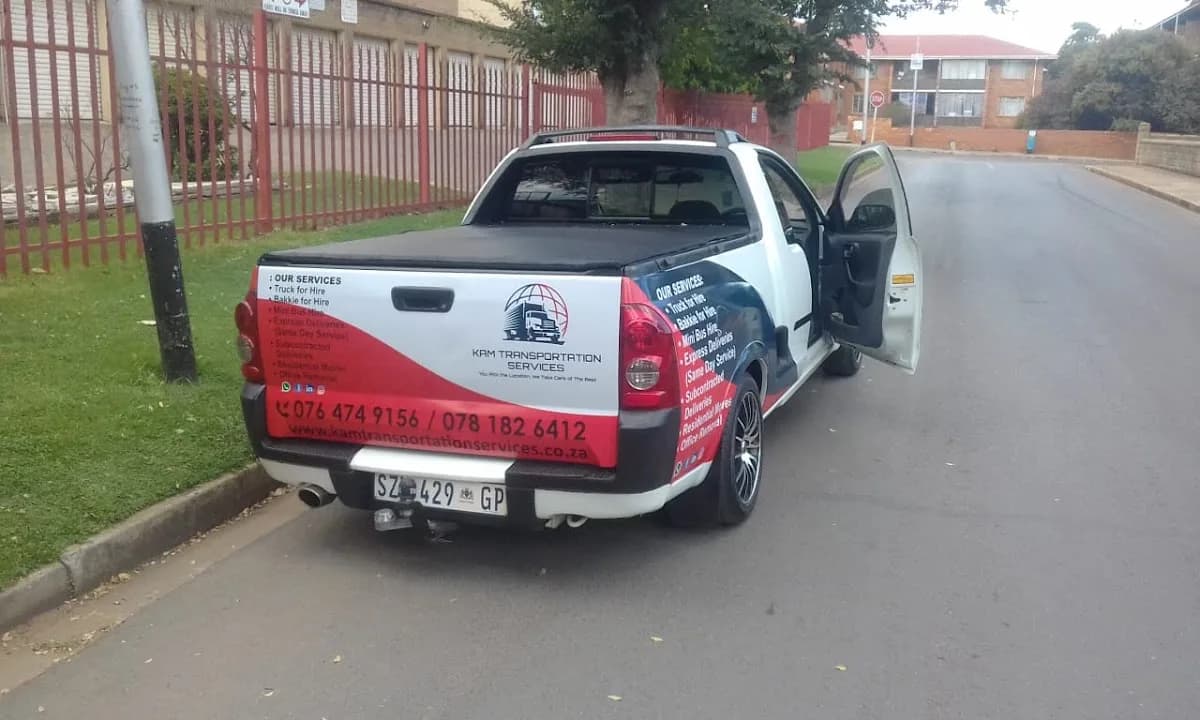Royal M branding and steel art in Alberton