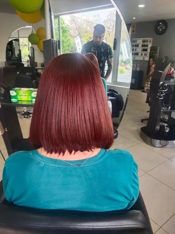 Hair by Bobby Singh in Linden