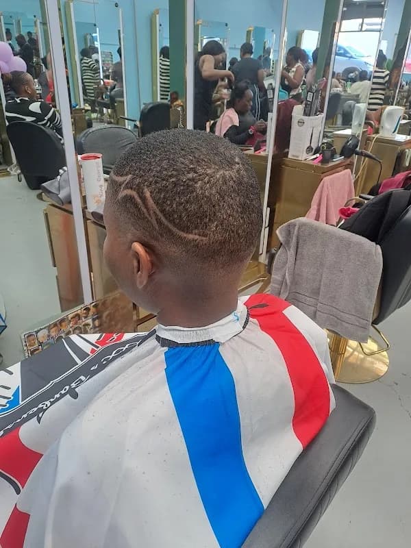 King George the barber in Tzaneen CBD